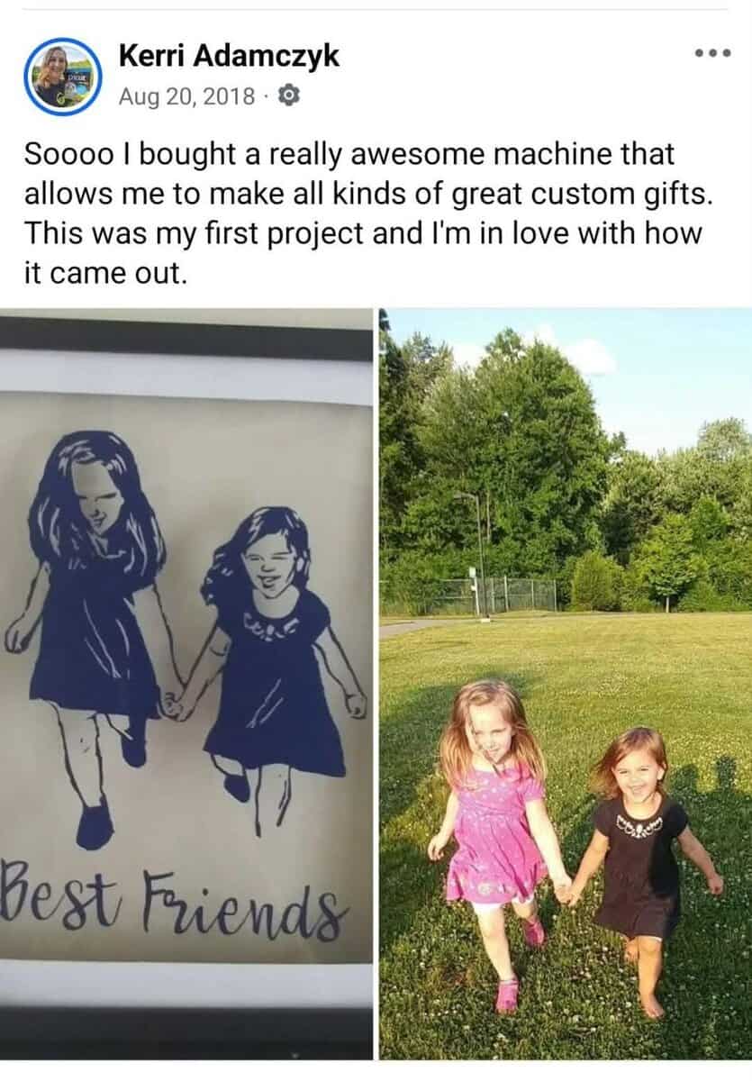 Facebook post screenshot from Kerri Adamczyk dated August 20, 2018, showing her first Cricut project. The post reads "Soooo I bought a really awesome machine that allows me to make all kinds of great custom gifts. This was my first project and I'm in love with how it came out." Below the text are two side-by-side images: on the left, a navy blue vinyl decal depicting two girls holding hands with "Best Friends" in script below; on the right, the original photo that inspired the design showing two young girls holding hands while walking through a sunny grassy field with trees in the background.