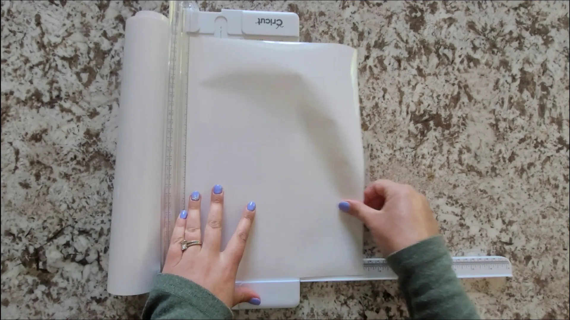 Father's Day Cricut Project: How to Make a DIY Fist Bump T-Shirt 6 Cutting heat transfer vinyl with Cricut trimmer