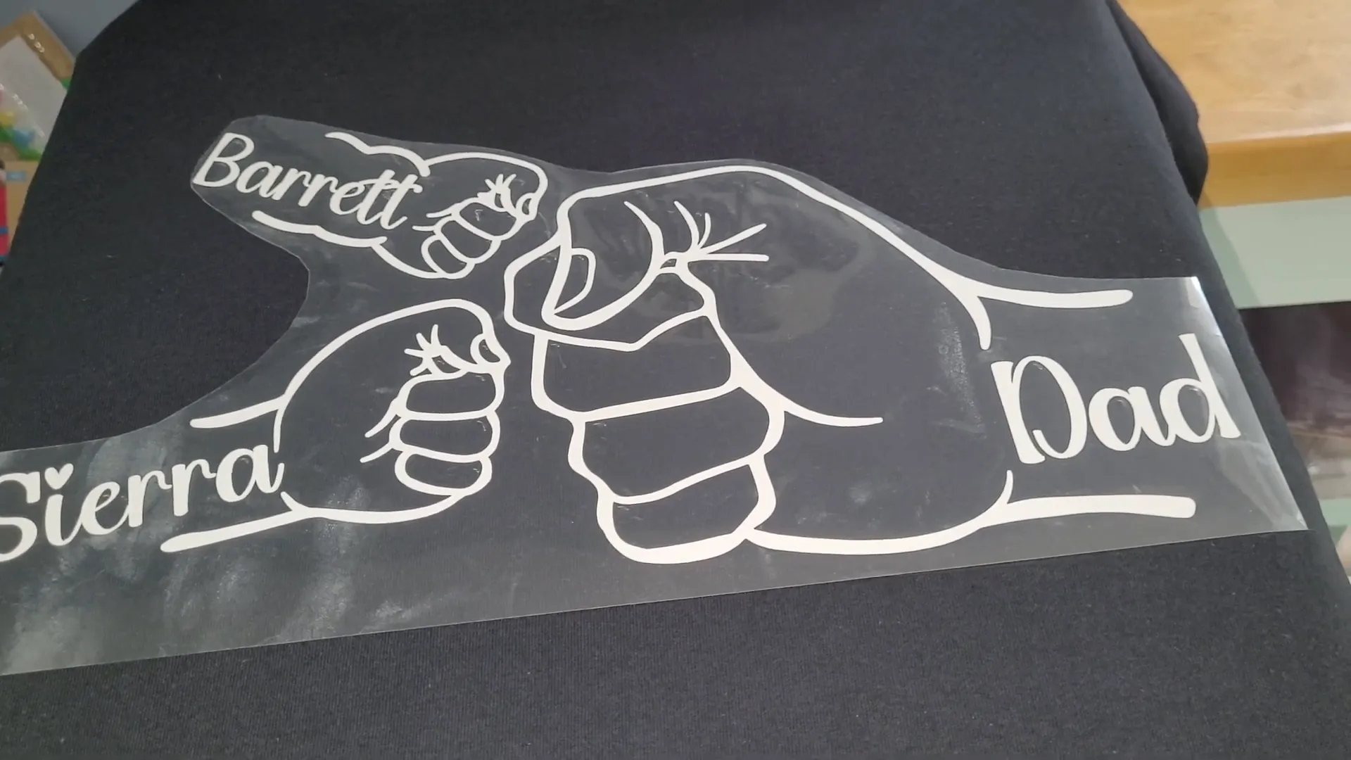 Father's Day Cricut Project: How to Make a DIY Fist Bump T-Shirt 10 Placing heat transfer vinyl design on shirt before pressing