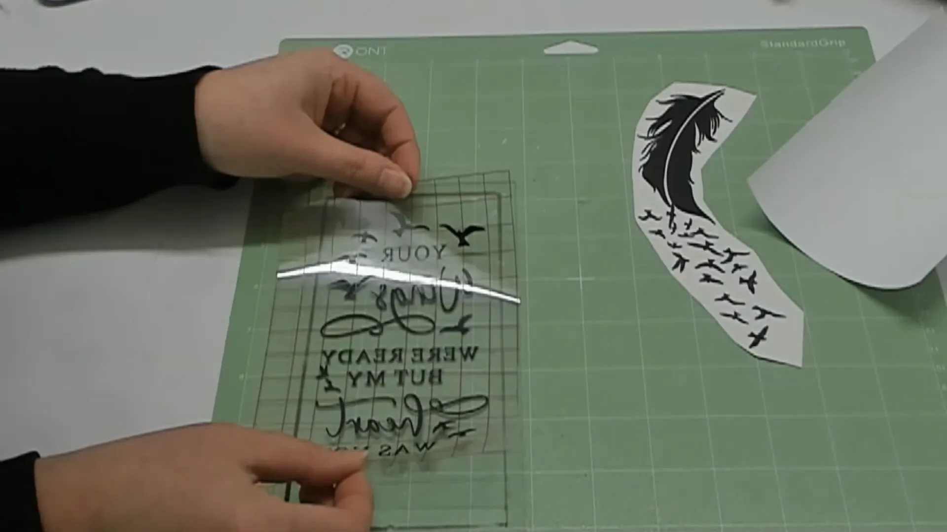 How to Make Memorial Lanterns with Cricut Easy DIY Guide 20 Applying transfer tape to vinyl using taco method