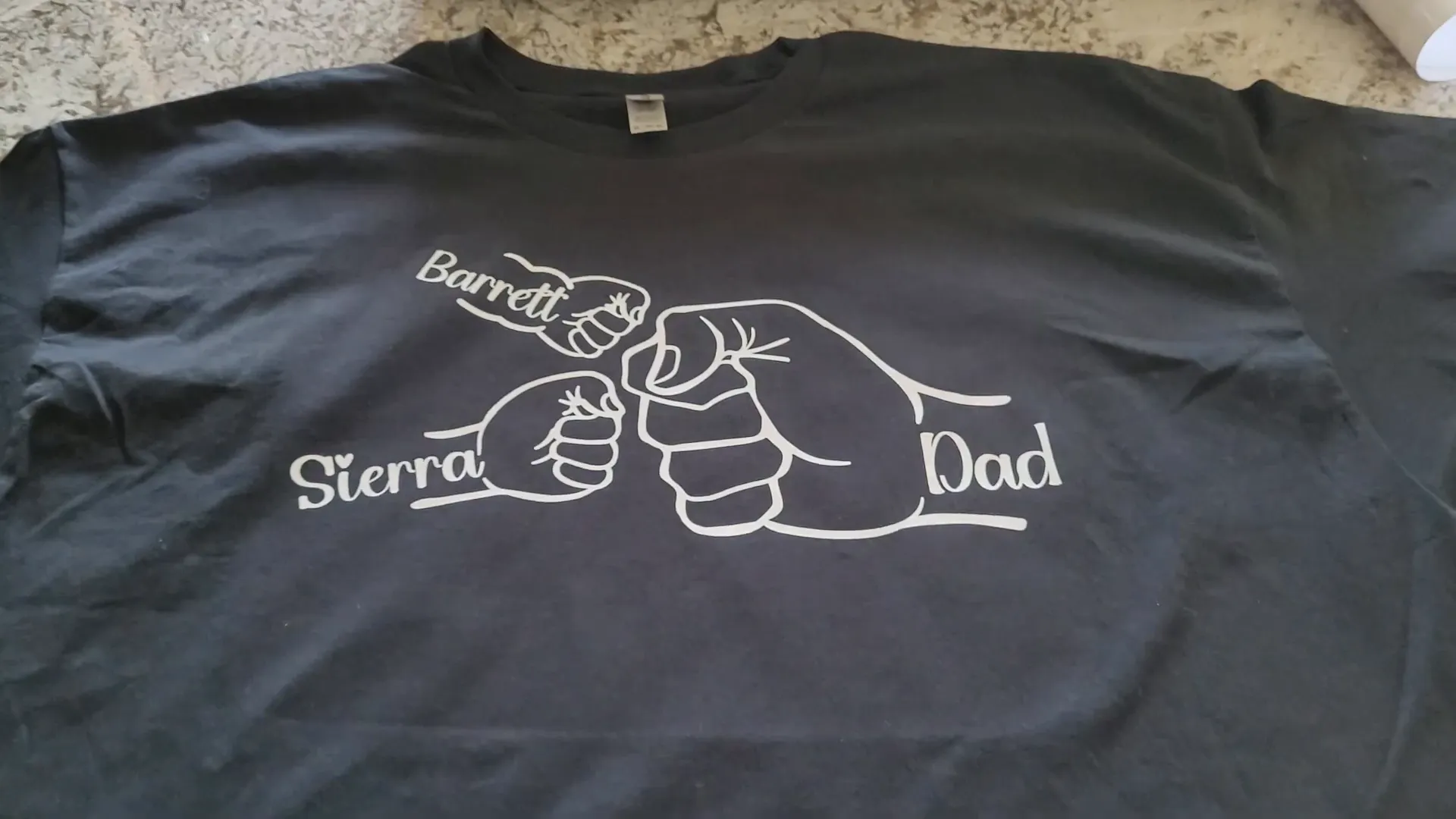 Father's Day Cricut Project: How to Make a DIY Fist Bump T-Shirt 11 Finished Father's Day Fist Bump T-shirt ready to wear