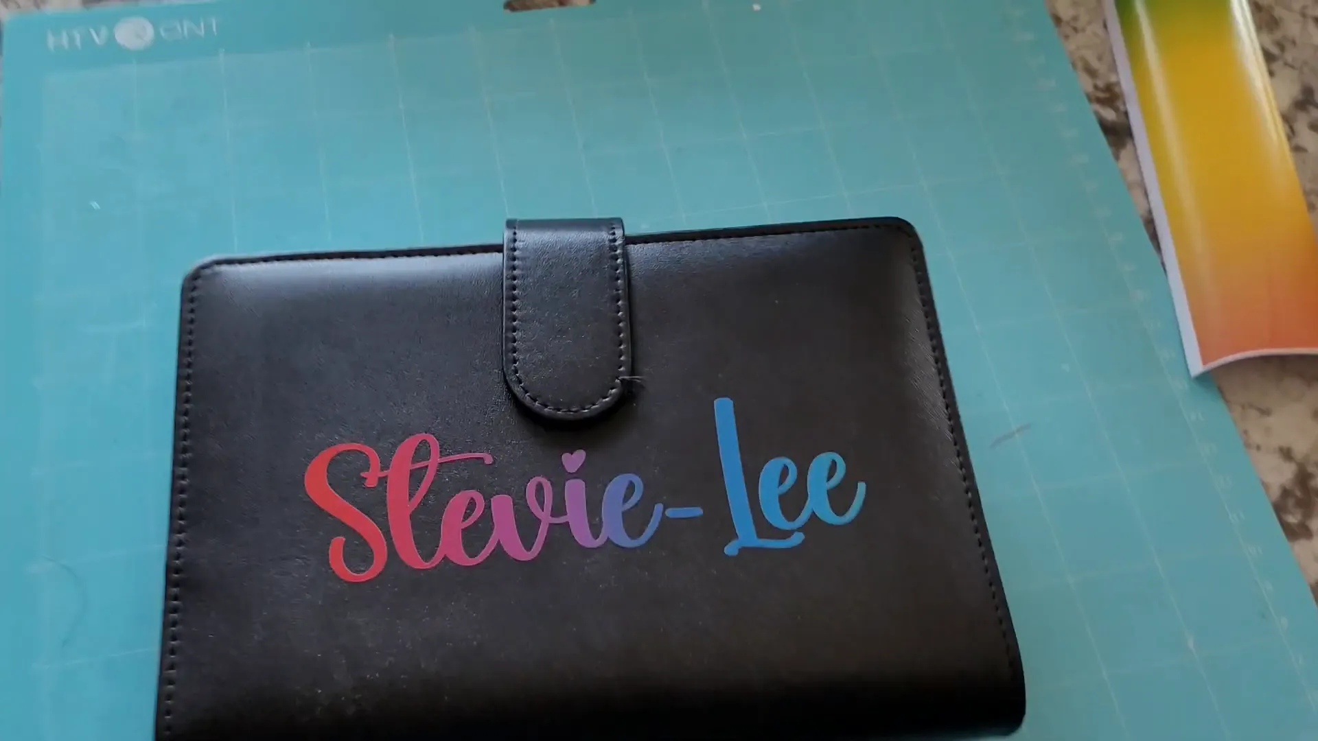 Personalizing Budget Binders with Vinyl and Cricut: Easy DIY Tutorial 11 Finished personalized budget binder with vinyl design