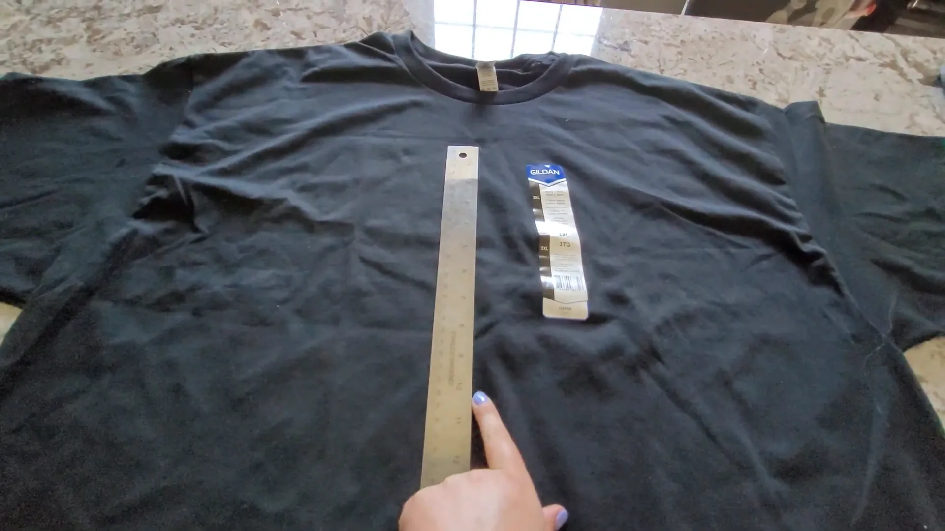 Father's Day Cricut Project: How to Make a DIY Fist Bump T-Shirt 5 Using a ruler to measure shirt for design sizing