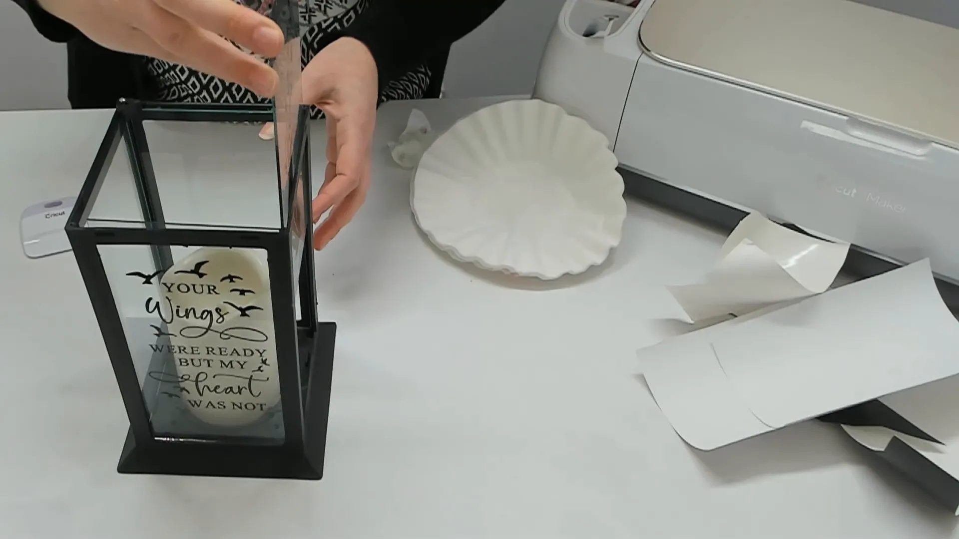 How to Make Memorial Lanterns with Cricut Easy DIY Guide 21 Sliding vinyl-covered glass panel back into lantern