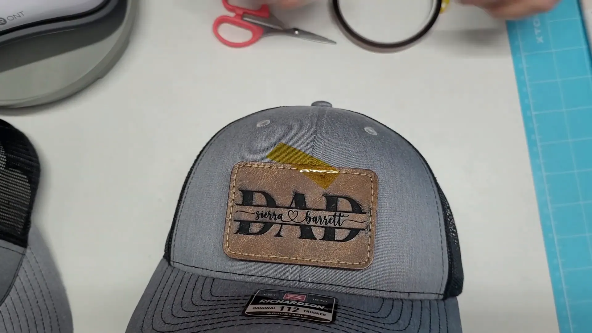 How To Make Leather Patch Hats 2 Ways: Laser Engraving & HTV xTool m1 9 Pressing leather patch onto hat using HTVRont Hat Heat Press