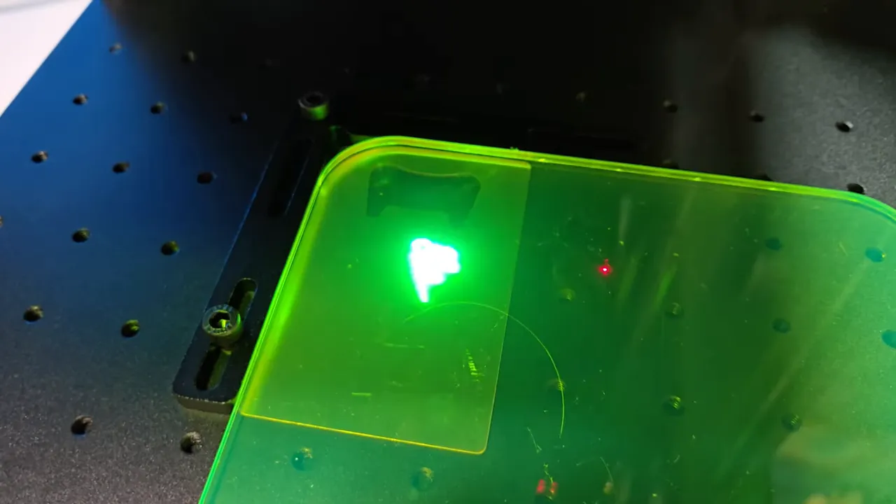 ComMarker Omni X Review: The New Way To Do 3D Glass Engraving at Home 4 Green transparent paddle showing projected outline for alignment