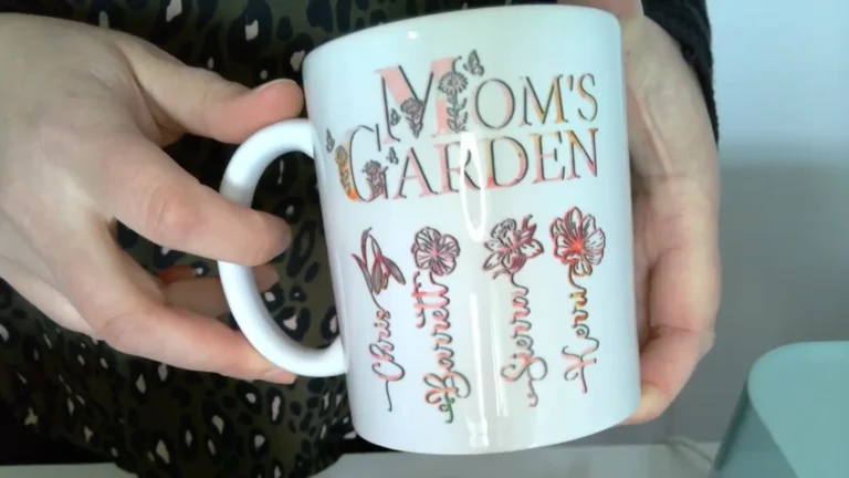 Finished sublimated coffee mug with a full colour personalized birth flower design