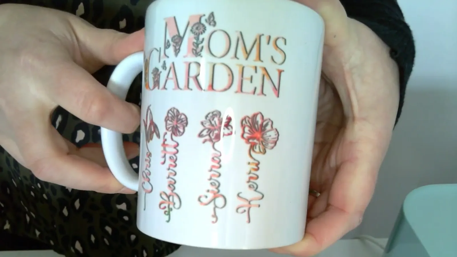 Close up of a finished sublimated mug showing a full colour personalized design