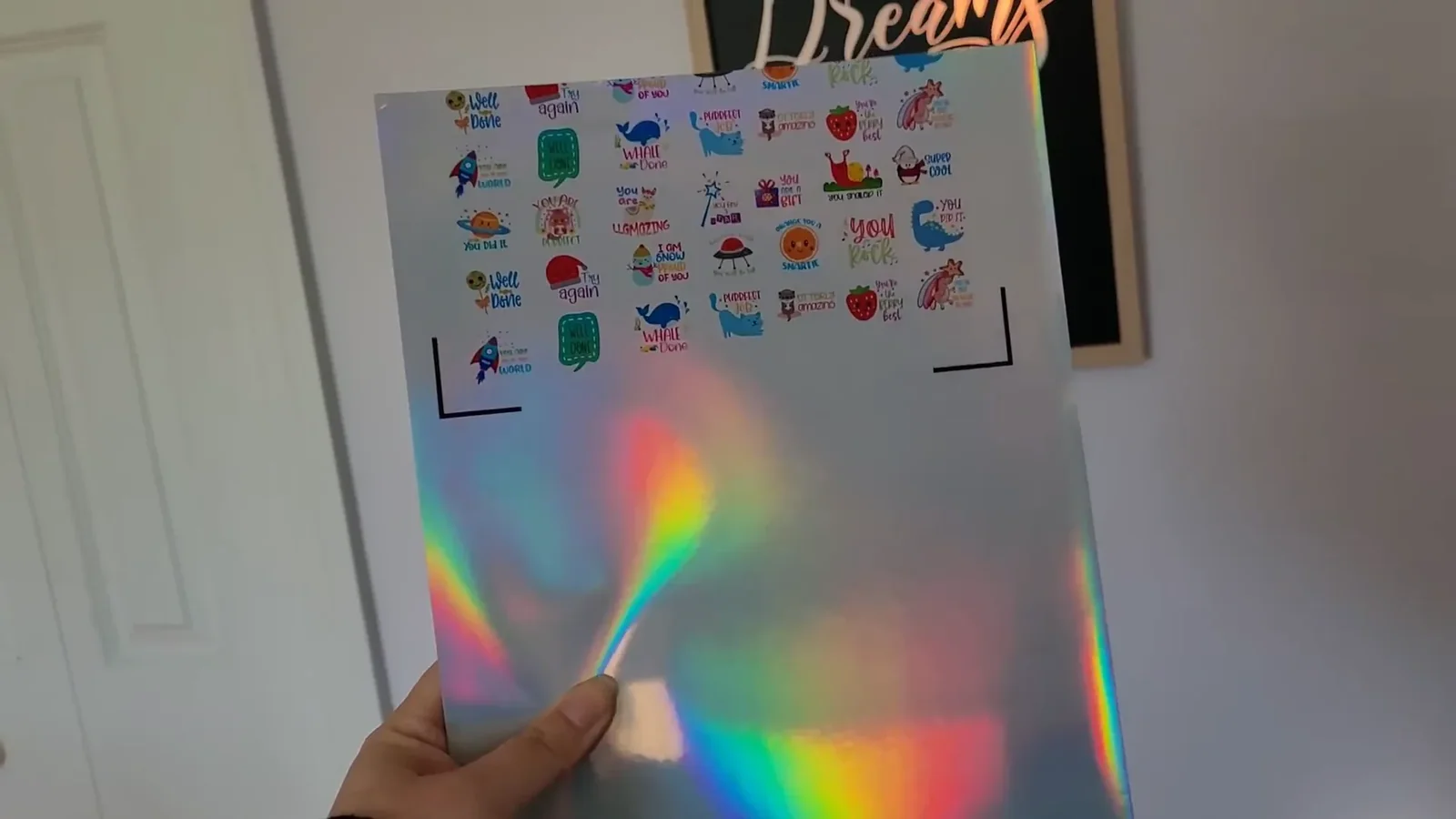 Holographic sticker paper sheet that only half printed before jamming in the inkjet printer