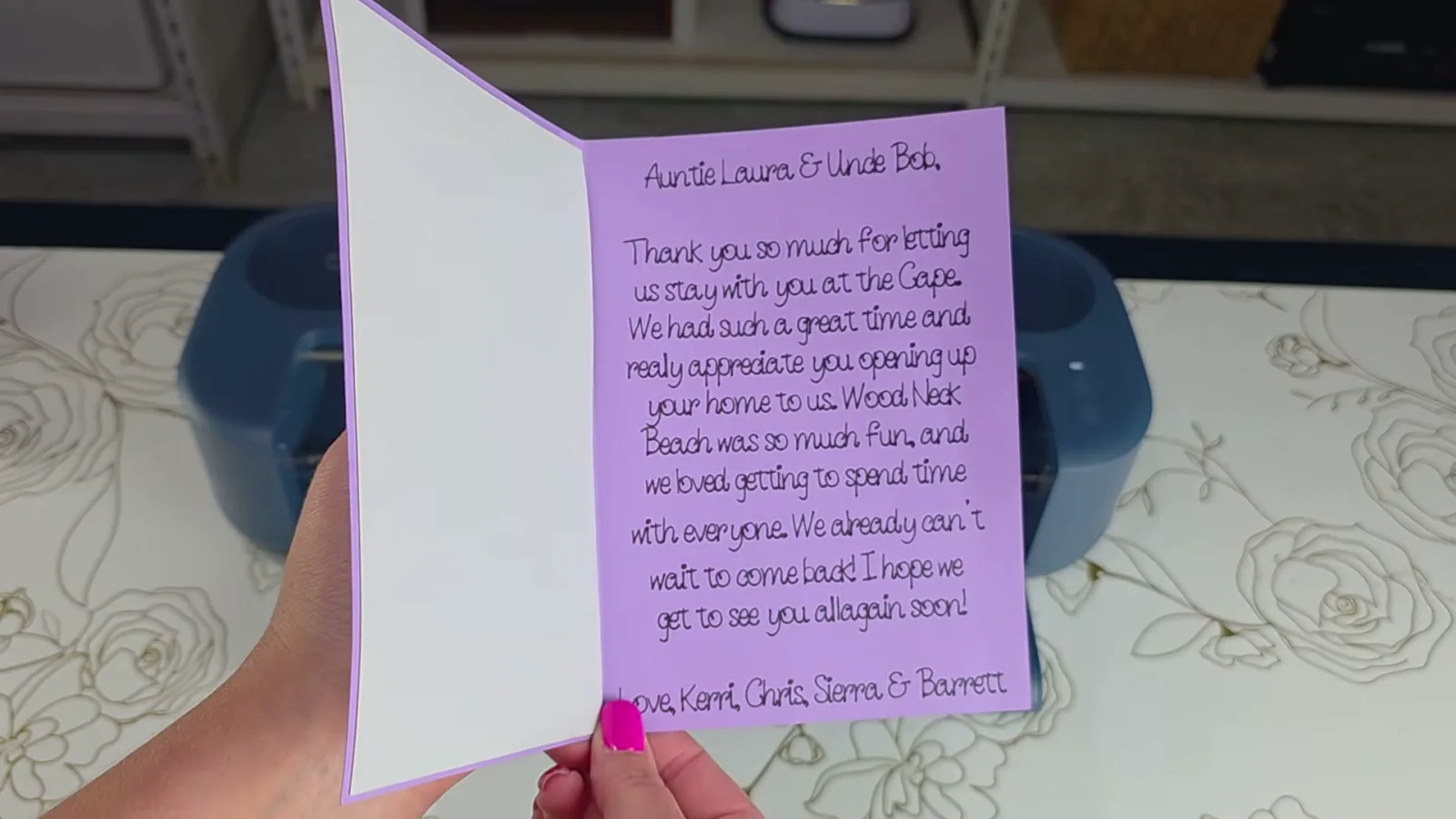 Inside of a folded purple thank-you card with a handwritten-style message drawn by the Cricut Maker 5 pen