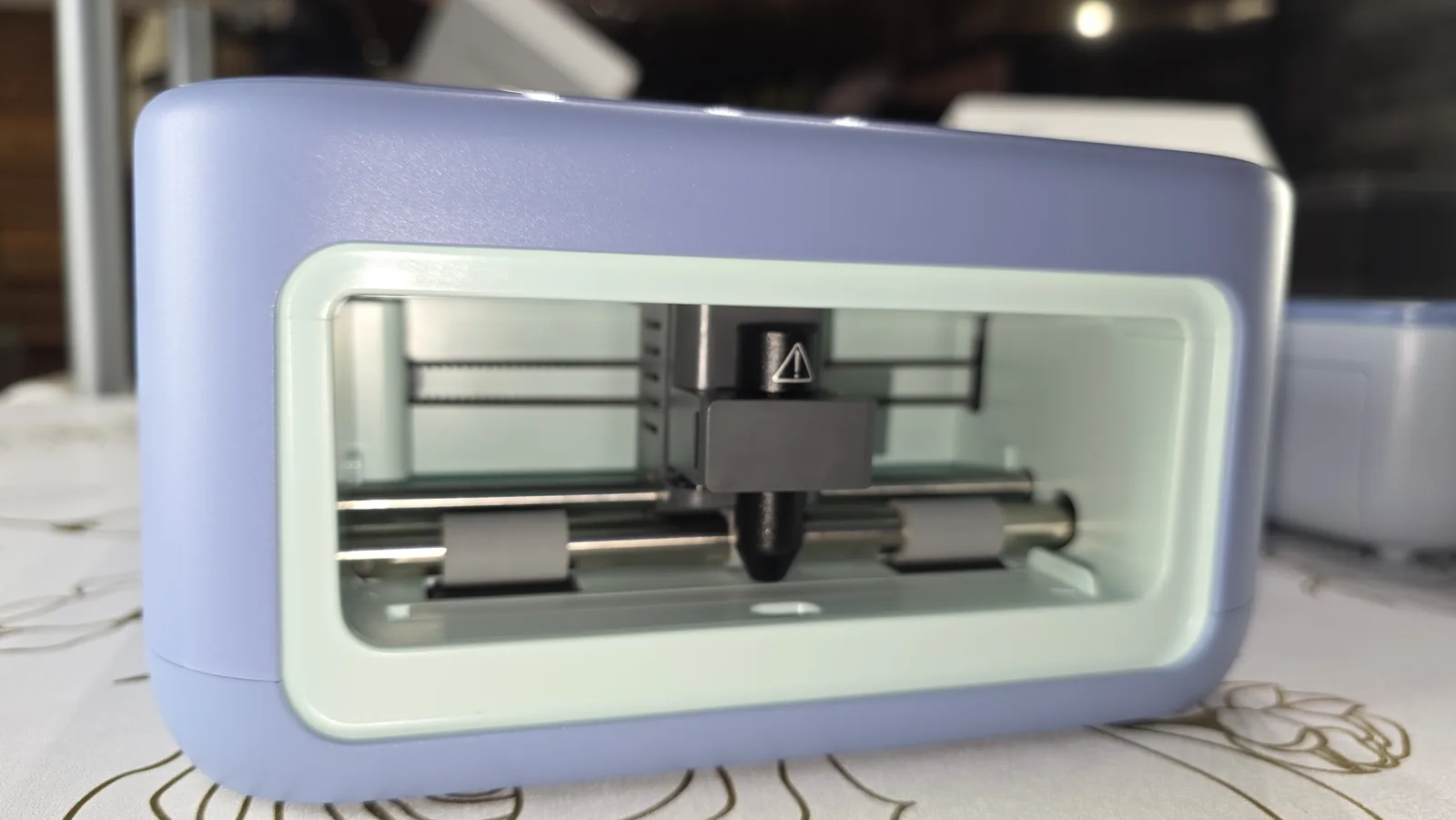 Built-in cutting blade inside the Cricut StickerPix Print + Cut