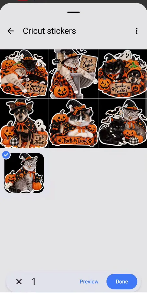 Uploading a Halloween cat sticker design from the phone photo library into Cricut Design Space