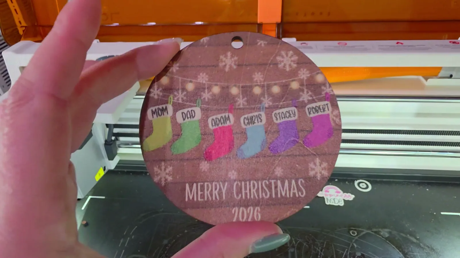 Ornament printed directly on bare basswood with the xTool M2, showing muted colors and white areas that look like wood