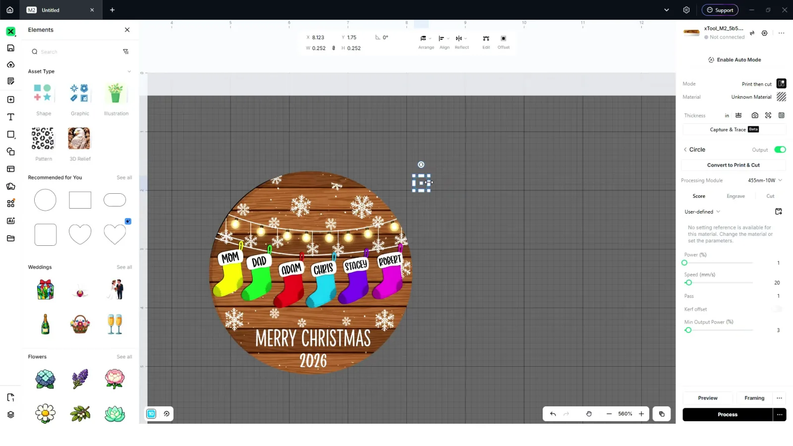 Ornament design in xTool Studio with a cut-line circle and a small hanging hole added for the xTool M2 print then cut job